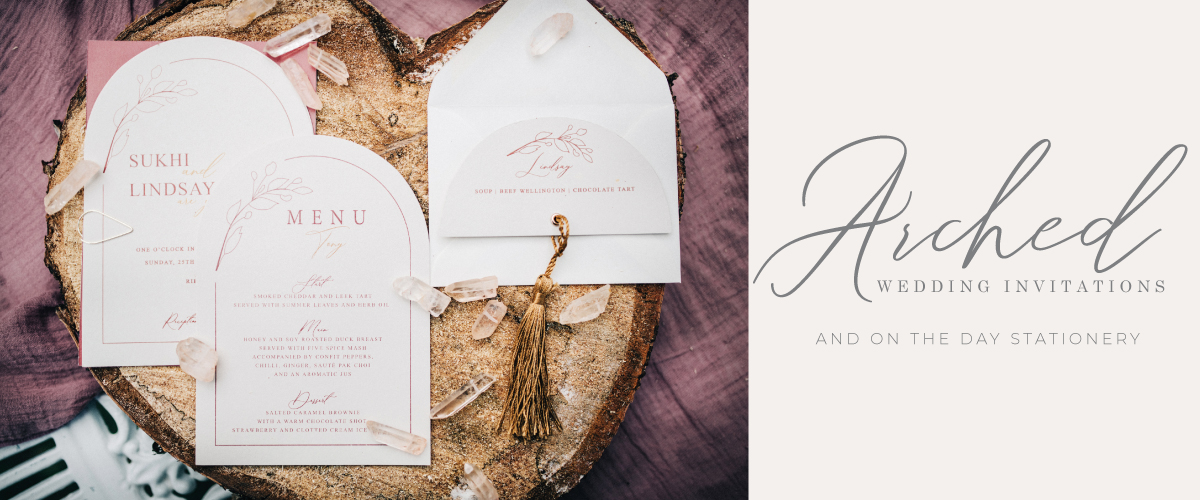 Beautiful arched wedding stationery which looks stunning finished off with eyelets & tassels